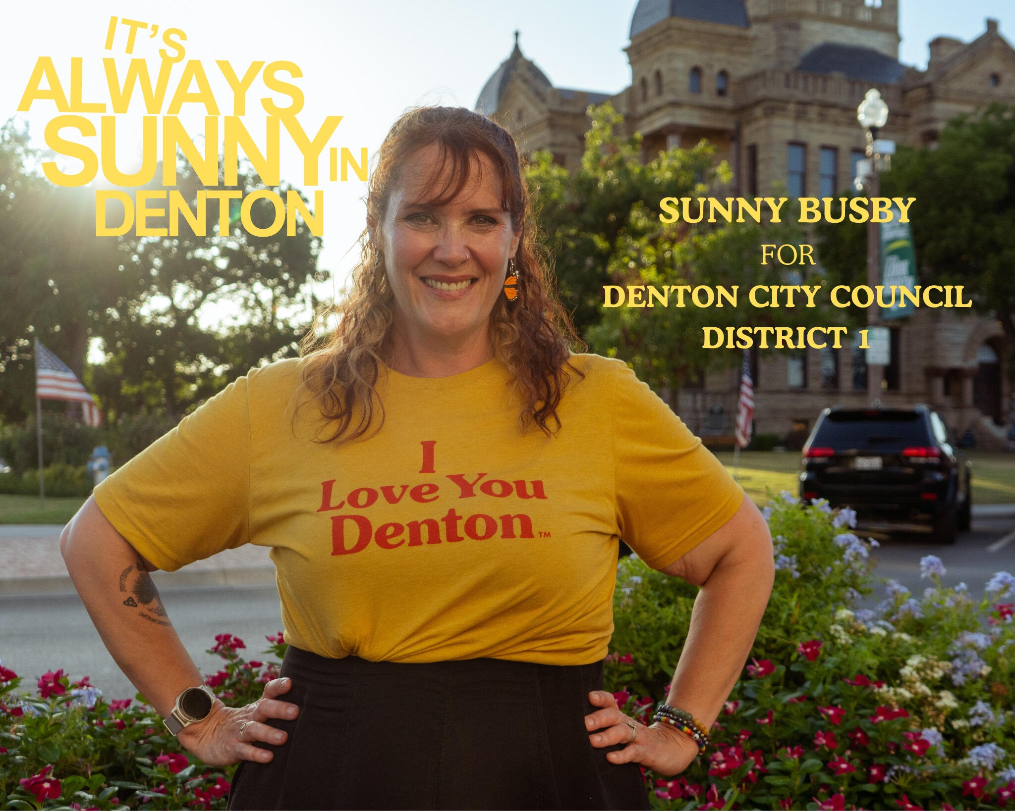 Sunny on the Denton Square wearing a shirt reading "I Love You Denton"
